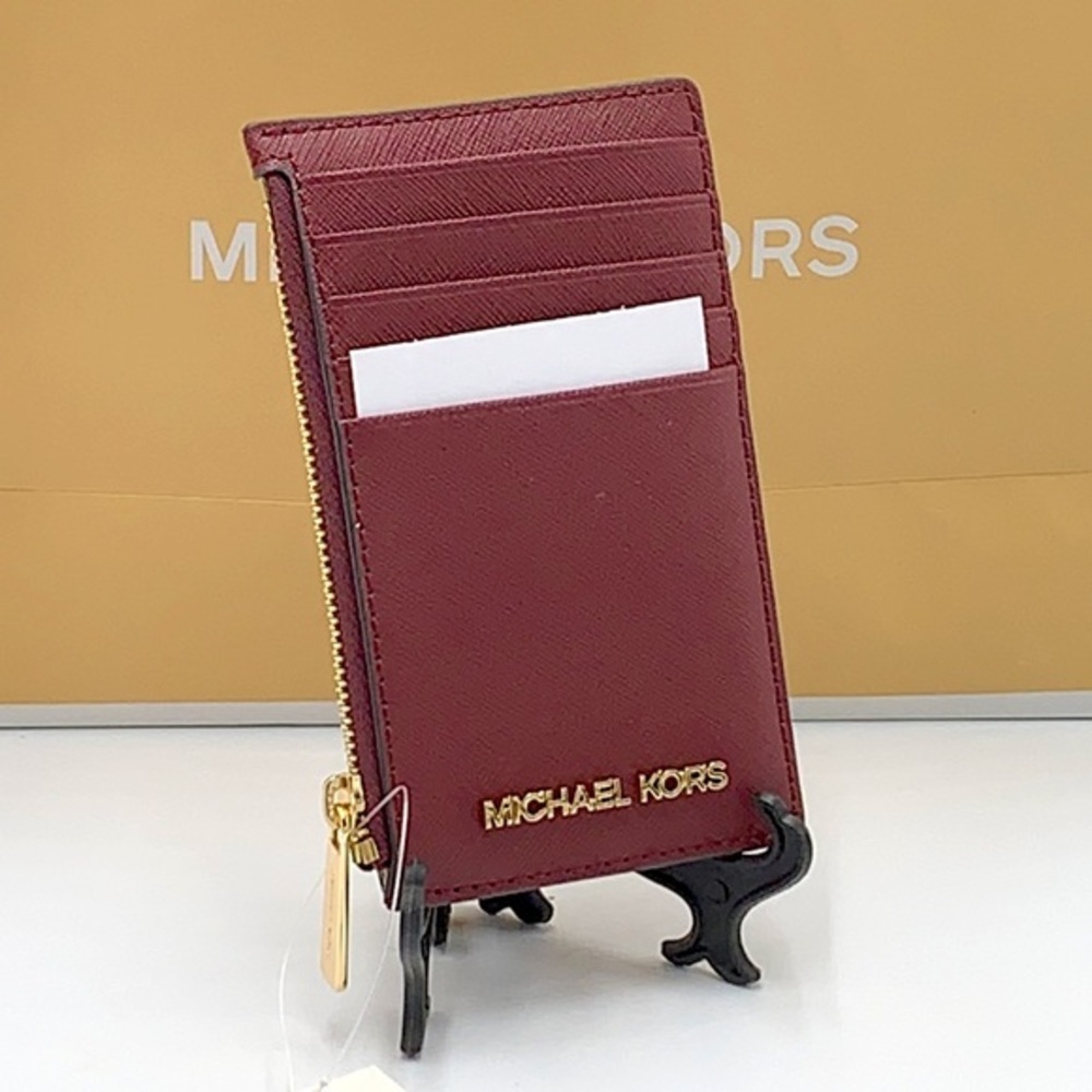Michael Kors Jet Set Travel Medium Top Zip Card
Case Wallet
Dark Sherry color